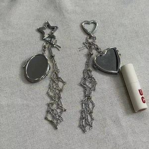 Pendentifs de sac en argent en forme d'étoile et de cœur avec de longs glands en métal