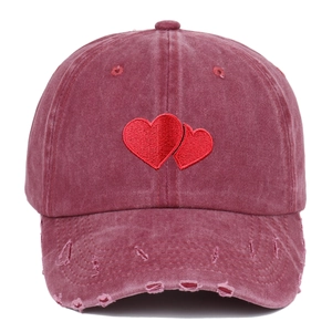 Vintage washed burgundy baseball cap with embroidered heart detail and distressed brim