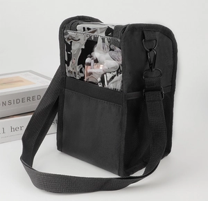 Detailed view of makeup brush bag with transparent PVC top and adjustable strap