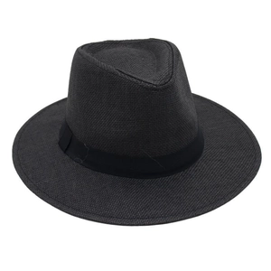 Detailed top view of black woven straw fedora hat with matching ribbon and indented crown