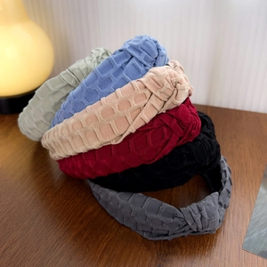 Cross knot wide headbands in various colors featuring textured fabric for women