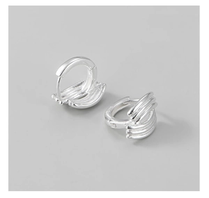 Detail shot of multi-layer S925 sterling silver hoop earrings with a polished finish