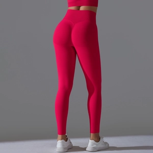 Detailed back view of high-waisted seamless rose red yoga pants with scrunch butt lifting effect
