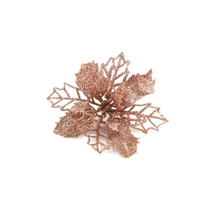 Detail of rose gold artificial Christmas flower with glitter petals and hollow design