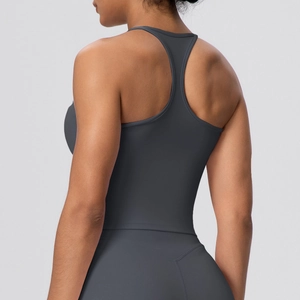 Close-up of racerback detail on dark gray yoga top with high-elastic matte fabric