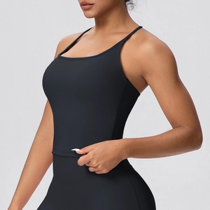 Close-up of black high-elasticity sports bra featuring thin straps and slim fit cut