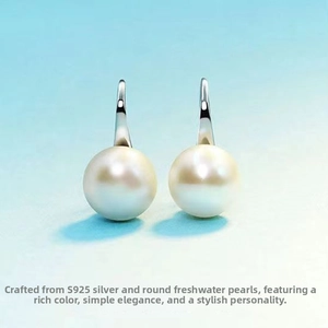 Detailed view of S925 sterling silver hooks with elegant white freshwater pearls
