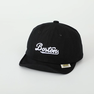 Close-up of Boston embroidery and brand label on a soft cotton black baby baseball cap