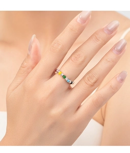 Close-up of S925 silver ring featuring colorful enamel beads on a model finger