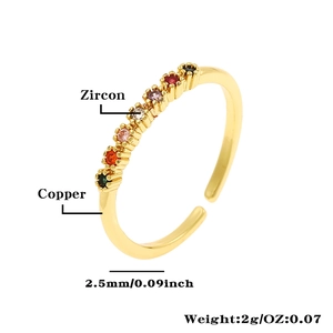 Detail of 18K gold plated copper ring with 2.5mm rainbow zircon stones and open band