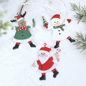 Set of 3 Christmas metal ornaments featuring Santa, Snowman and Reindeer on white snow