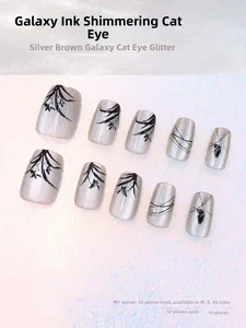 Cat eye press-on nails detail showing ink bamboo design and 30-piece size specifications