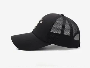 Side view of black mesh baseball cap featuring white embroidery and breathable mesh back