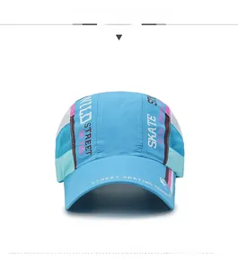 Detail of light blue quick-dry baseball cap with breathable mesh and street style prints