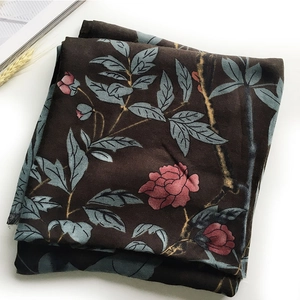 Deep brown satin scarf with pink flowers and blue leaves print on white background