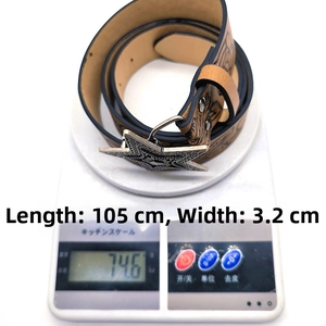 Detailed view showing 105cm length and 3.2cm width of vintage star buckle leather belt