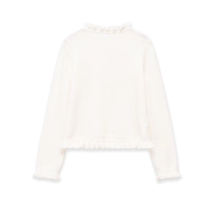 Detail view of girl's white knit sweater featuring delicate ruffled collar and elastic cuffs