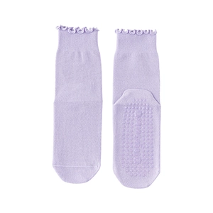 Lavender yoga socks for women featuring ruffled cuffs and anti-slip silicone grip soles