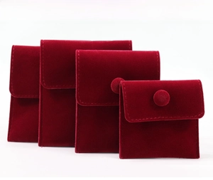 Burgundy velvet jewelry pouches in four sizes with snap closure for rings and necklaces