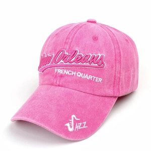 Detail of pink washed vintage baseball cap with New Orleans Jazz embroidery on brim