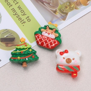 Christmas resin charms featuring a festive tree, reindeer in sock, and cute winter bear