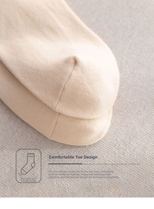 Detail of reinforced toe area on cotton socks with smooth flat-seam stitching for durability