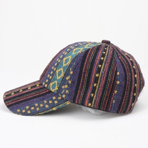 Close-up of bohemian baseball cap featuring vibrant multi-color woven geometric textures