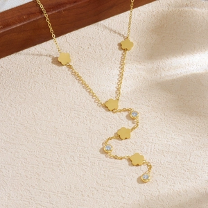 Gold-plated stainless steel Y-necklace with polished flower charms and zircon stones