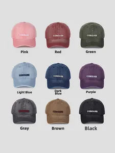 Detail view of American vintage washed denim baseball caps with CONQUER embroidery in 9 colors