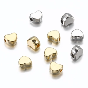 Polished heart-shaped loose beads in gold and silver finish for DIY jewelry making
