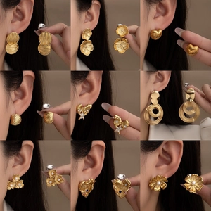 Chic vintage style gold titanium steel earrings in flower and heart shapes for women
