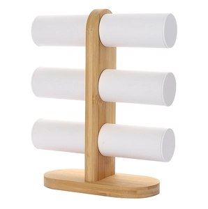Three-tier bamboo jewelry display stand with white cylindrical tiers for watches and bracelets