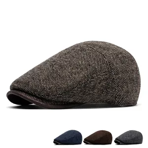 Classic tweed newsboy cap for men featuring warm winter fabric in multiple vintage colors