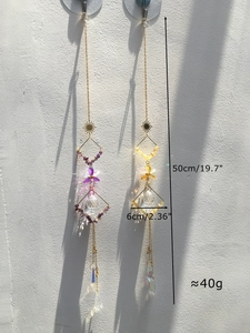 Detail view of crystal suncatcher measurements and rainbow refraction effects on wall