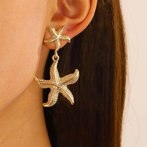 Elegant gold starfish drop earrings featuring textured double sea star charms for women