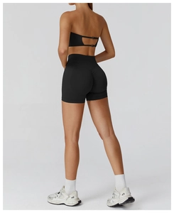 Detail of black high-waisted yoga shorts featuring scrunch butt design for lifting