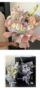 Detailed view of luxury bouquet wrapping with pearlescent paper and artistic layering