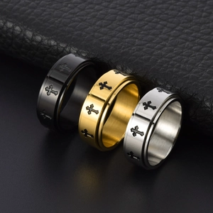 Minimalist stainless steel spinner rings with cross pattern in black gold and silver