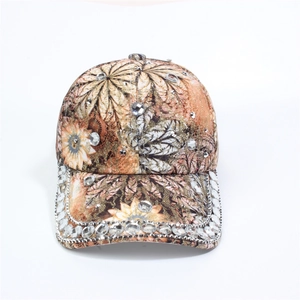 Macro shot of baseball cap with floral prints and sparkling rhinestone decorations