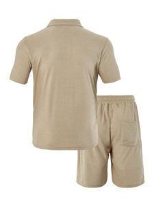 Detail of khaki men's summer polo and shorts set with waffle textured jacquard fabric