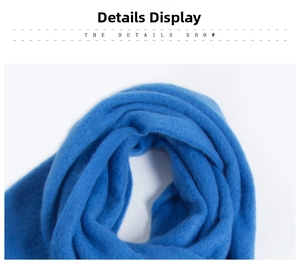 Macro detail of soft thick blue mohair scarf texture showing rich fuzzy fluffy fibers
