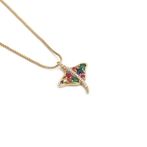Fashionable gold stingray pendant necklace featuring colorful zircon stones on a white background