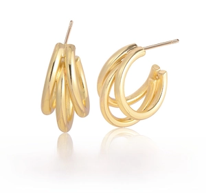 Close-up of triple-layered golden geometric hoop earrings with polished electroplating