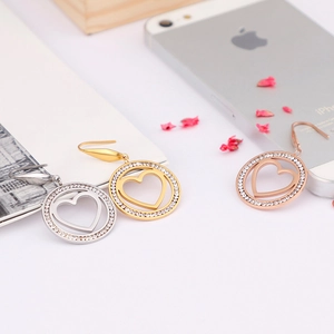 Set of three hollow heart earrings with crystals in gold, silver and rose gold finish