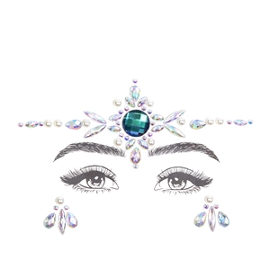 Detailed face and body jewels featuring green rhinestones and pearls on white background