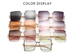 Matrix display of multi-color oversized square rimless sunglasses with gold chain temples