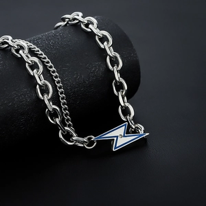 Silver double layer lightning necklace with blue enamel pendant on black display
