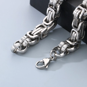 Detail of silver stainless steel Byzantine chain with large lobster clasp closure
