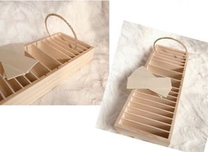 Macro view of wooden organizer with adjustable dividers for hair clips and jewelry
