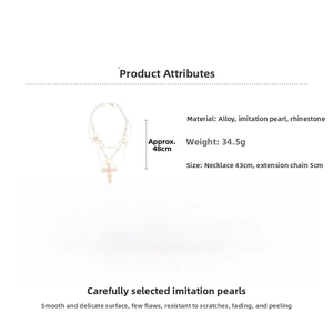 Detailed specs of double-layer cross necklace with pearls and pink heart crystal
